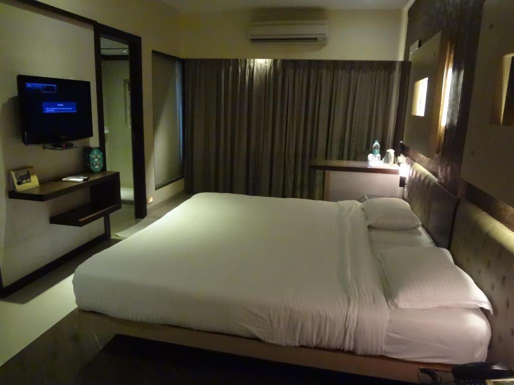 Hotel Capitol Thane Habitación foto